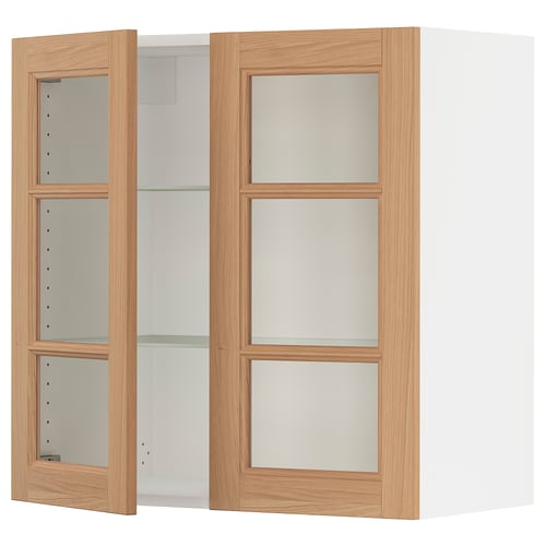 A light brown wooden cabinet with glass doors. It three shelves inside, and the frame is sturdy and modern.