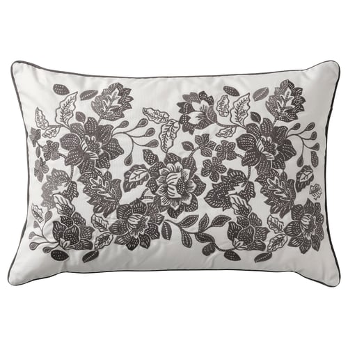 SKUGGNÄVA grey embroidered throw pillow, white floral on one side, solid grey reverse, button closure.