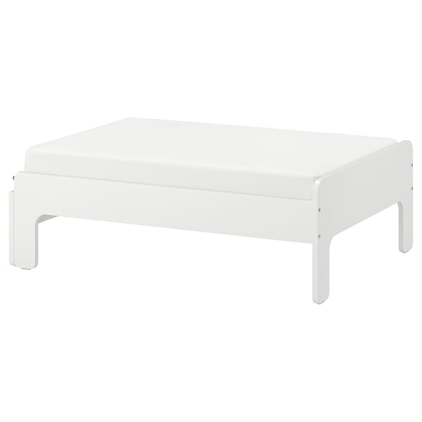 A white SLÄKT childrens bed with sleek, modern design and acrylic painted fibreboard material.