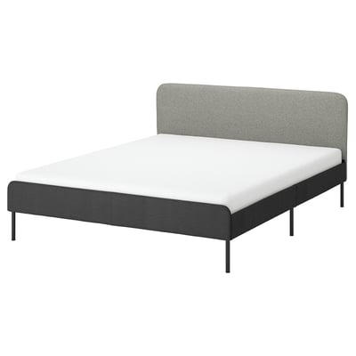 A modern grey SLATTUM bed with a padded headboard and metal legs, set against a white background.