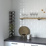 SNÖSPIRA 4-bottle wine rack, black