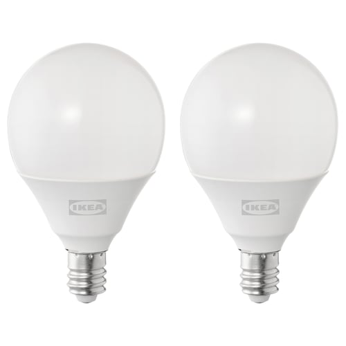 Two round white ikea bulbs with silver bases.