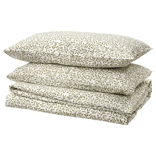Folded white and green leaf patterned duvet set, rectangular, crease-free, 100% recycled polyester and cotton blend.
