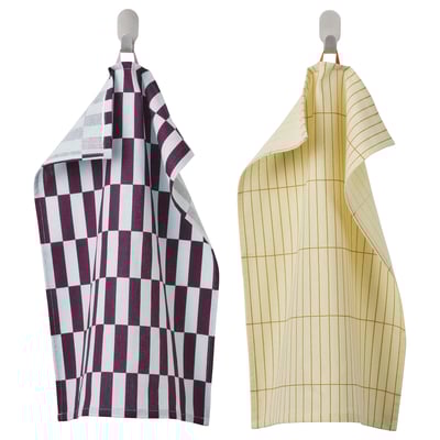 Two hanging towels: one maroon & white chequered, one yellow striped, both cotton.