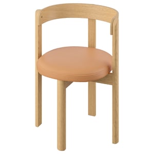 STOCKHOLM 2025 chair, natural wood, peach cushion, round shape, modern design.