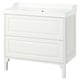 Depicts a TÄNNFORSEN white bathroom cabinet with a ceramic sink. It two drawers and a sleek, classic design with bevelled panels.