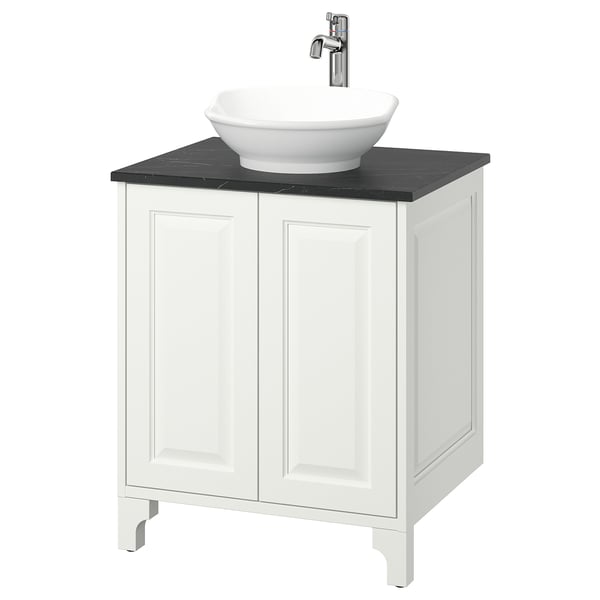 White TÄNNFORSEN vanity with black countertop, round basin, chrome tap.