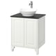 White TÄNNFORSEN vanity with black countertop, round basin, chrome tap.
