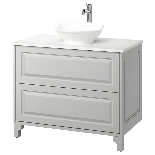 Light grey TÄNNFORSEN bathroom vanity, round sink, full extension drawers.