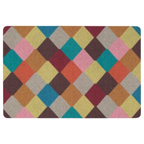 A colourful TORGPLATS doormat with diamond patterns in various shades, made from recycled polyester, featuring rounded corners and a rubber backing.