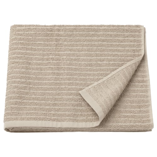 Beige VÅGSJÖN towel, soft cotton with stripe design.