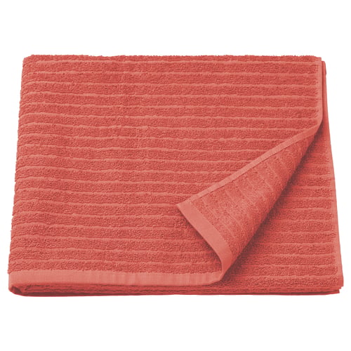 Bright coral VÅGSJÖN towel, rectangular, soft 100% cotton with ribbed texture.