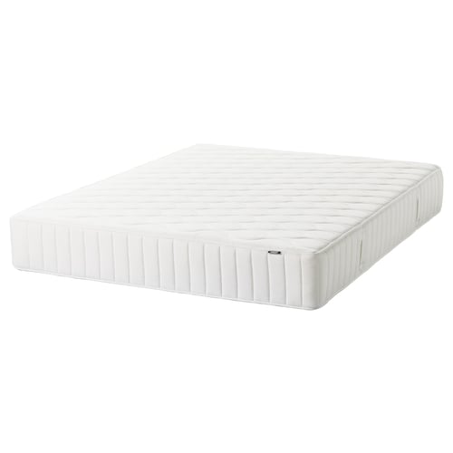 This is a VÅGSTRANDA white mattress by IKEA. It a quilted design with reinforced edges and is made of polyester and polyurethane foam.