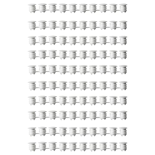 Rows of white VARIERA cabinet hole caps in polyethylene plastic, cylindrical with flanged tops.