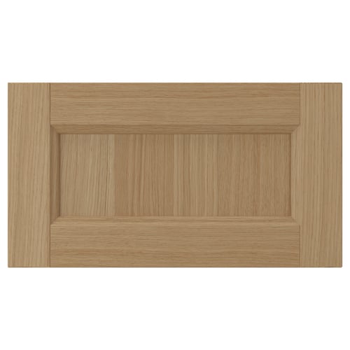 Light brown VEDHAMN cabinet door, oak frame & panel.