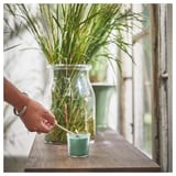 HEDERSAM Vela aromática en vaso, hierba fresca/Verde claro, 20 hr