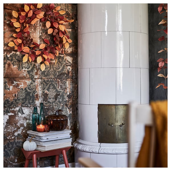 HÖSTAGILLE Vela aromática en vaso, calabaza/café, 20 hr