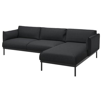 Modern dark grey l-shaped sofa with sleek metal legs and plush cushions.