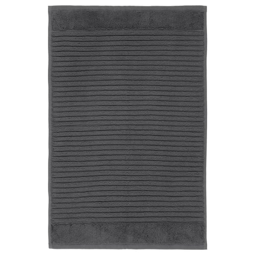 Dark grey ALSTERN cotton bath mat, rectangular with textured striped design.