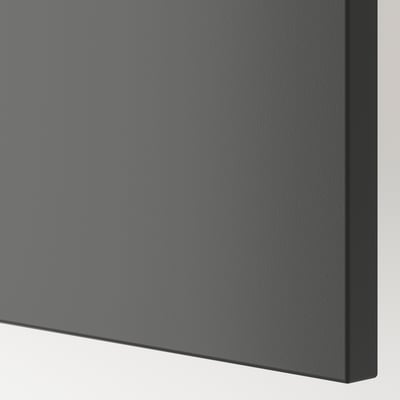 Close-up of smooth, dark grey BESTÅ unit with sleek and modern edges.