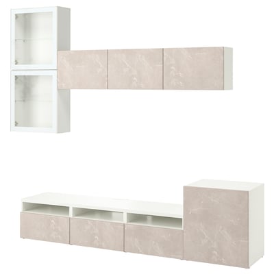 Versatile white BESTÅ tv unit with marble-effect doors and glass display shelves, offering storage and cable management.