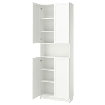 A white BILLY bookcase with both open and closed storage. It multiple shelves for customizable organisation.