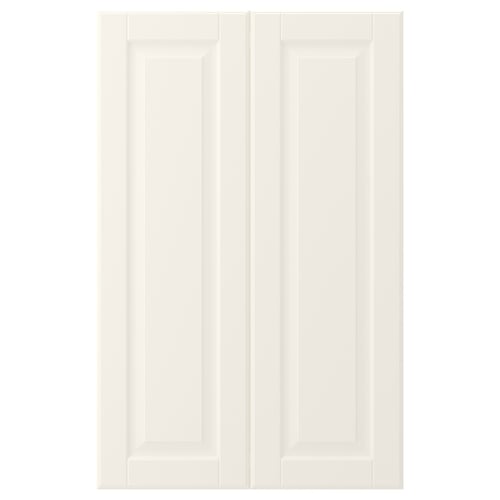 Depicts a white BODBYN cabinet door with bevelled edges and a smooth, lacquered finish. Its rectangular with a traditional design.