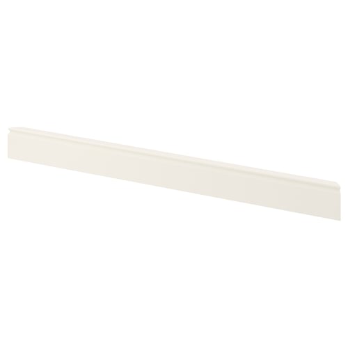 A white FÖRBÄTTRA plinth, a decorative kitchen skirting board made of fibreboard and plastic foil.
