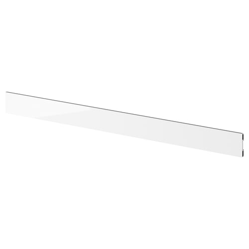 A glossy, white kitchen plinth made of plastic, designed to fit seamlessly under base cabinets.