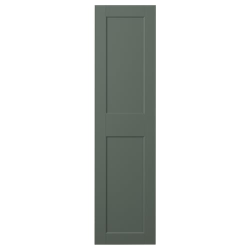 GRIMO door in grey-green has a modern and traditional shape, featuring wide framed panels and a clean line design.