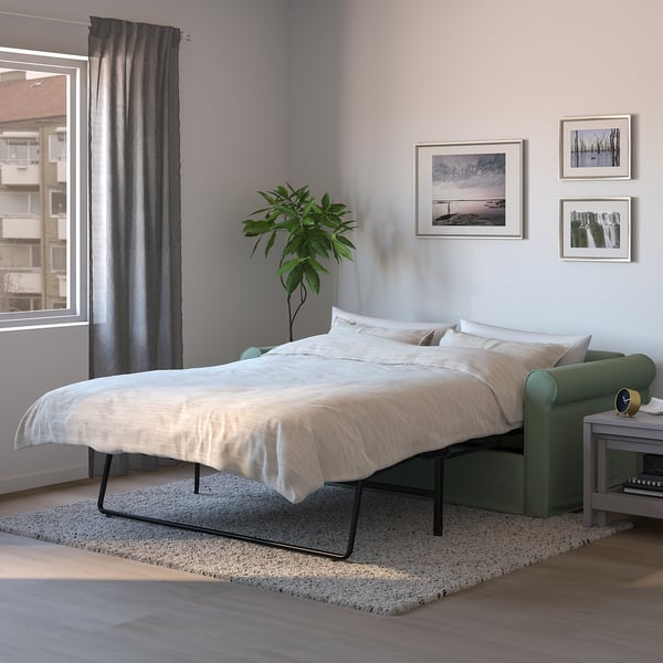 GRÖNLID 2-seat sofa-bed, Ljungen light green
