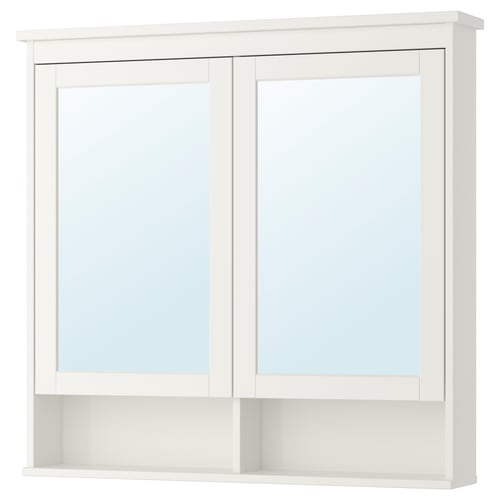 White HEMNES mirror cabinet with two doors and adjustable shelves.