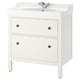 White HEMNES bathroom vanity, rectangular with rounded corners, two drawers, oval sink, chrome tap.