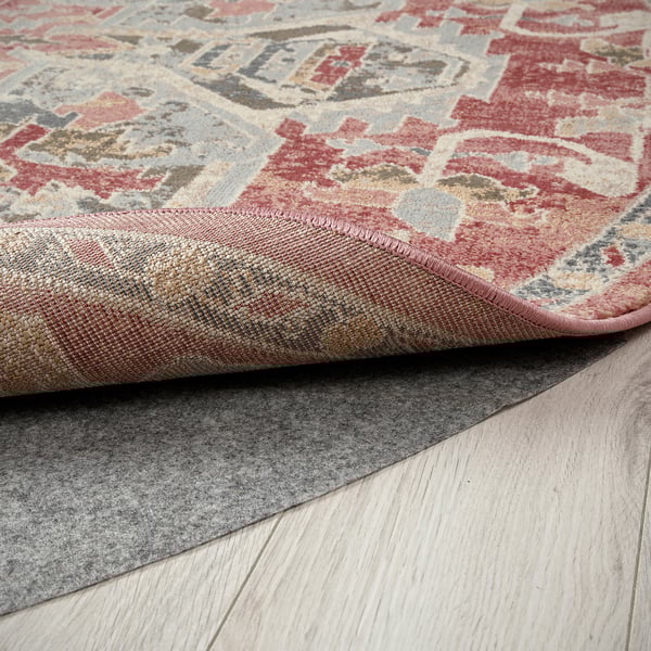 Rug with intricate pastel patterns. Soft, durable, and stain-resistant surface. Fits various flooring types, ideal for high-traffic areas.