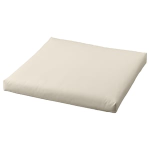 A rectangular cream-colored outdoor cushion named KUDDARNA with recycled materials and anti-slip backing.