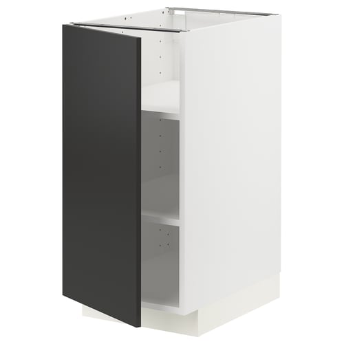 A modern, white METOD kitchen cabinet with a black matt nickebo door, adjustable shelves.