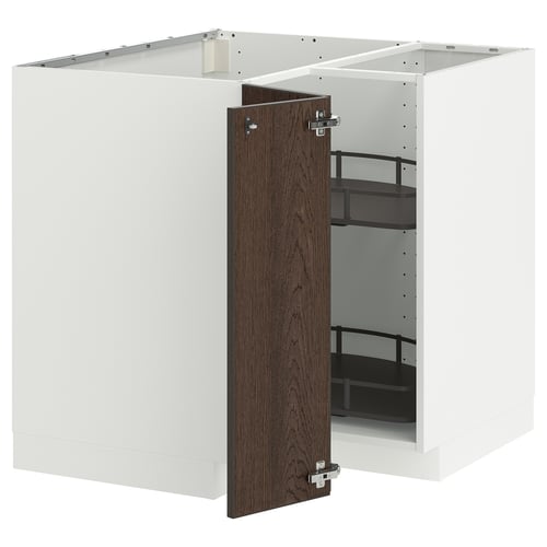 White kitchen cabinet with dark brown door, shelves, and metallic hinges.