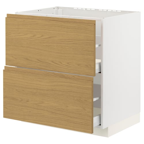 A METOD kitchen cabinet with oak-colored voxtorp drawers and white sides, designed for built-in appliances or a kitchen sink.