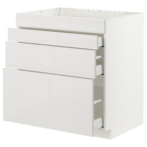Modern white kitchen cabinet with four pull-out drawers.