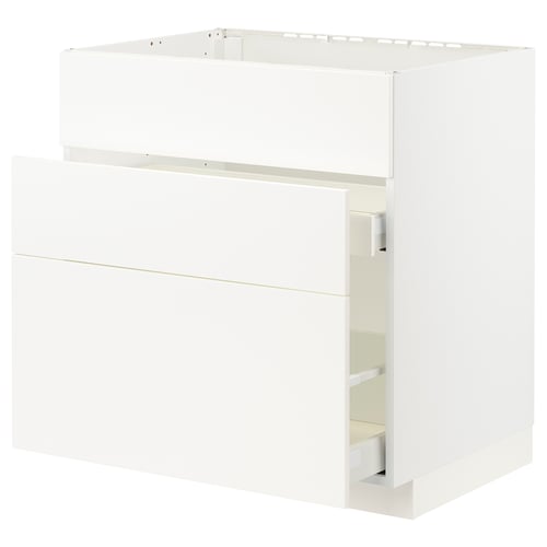White METOD kitchen cabinet set, modern design with smooth surfaces and drawers.