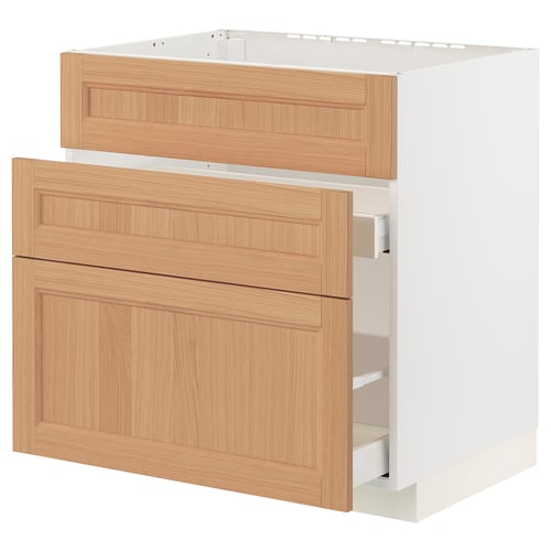 A METOD kitchen cabinet with two wooden drawers, oak colour, and a white base. It smooth-running drawers with a natural, warm look.