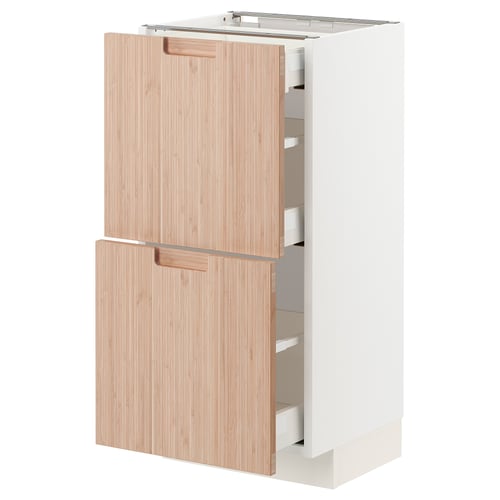 Modern kitchen cabinet, white with natural bamboo doors, featuring two drawers and a pull-out shelf.