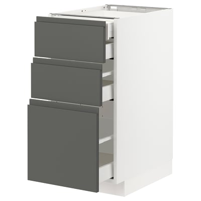 METOD kitchen unit: 3 dark grey drawers, white cabinet, sleek modern design.