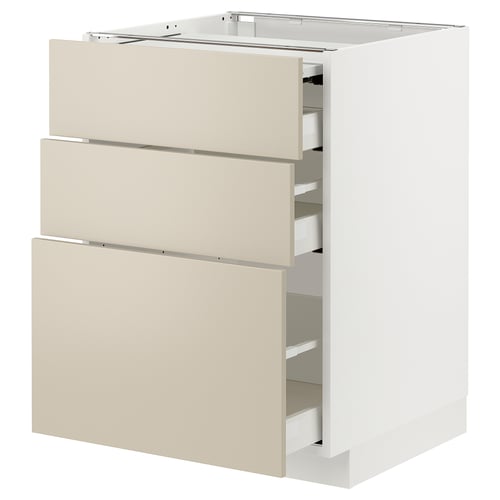 A white METOD kitchen cabinet with beige drawers, featuring a sleek, modern design.