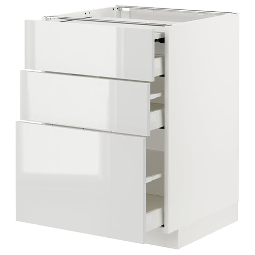 Modern METOD kitchen unit with glossy white drawers, sleek and clean design.
