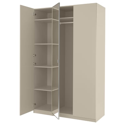 An open beige PAX wardrobe with multiple shelves and hanging space.