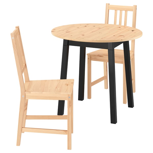 PINNTORP dining set: round table, 2 chairs, wood finish, black underframe/supports