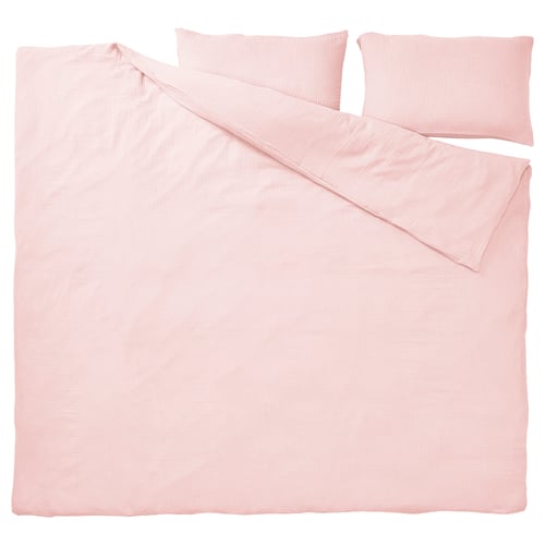 A SCHERSMIN bedding set in light pink, featuring a duvet cover and pillowcases, made of 100% organic cotton.
