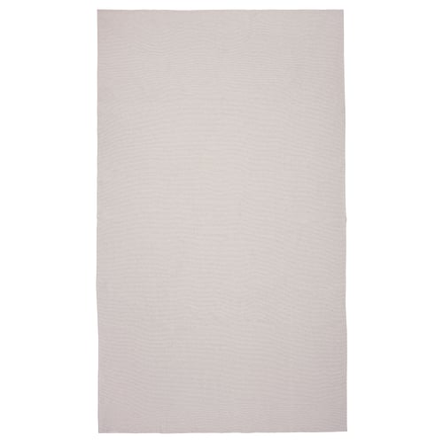 A silver arv beige tablecloth. It a natural textured weave with cotton and jute, offering a warm and traditional look.