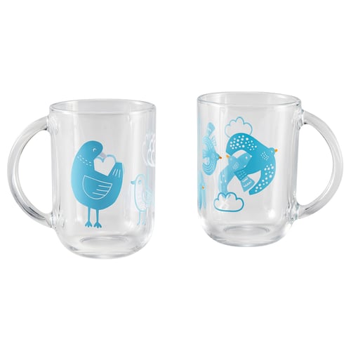 Two clear glass mugs with blue bird designs. Mugs have handles and are displayed side by side.